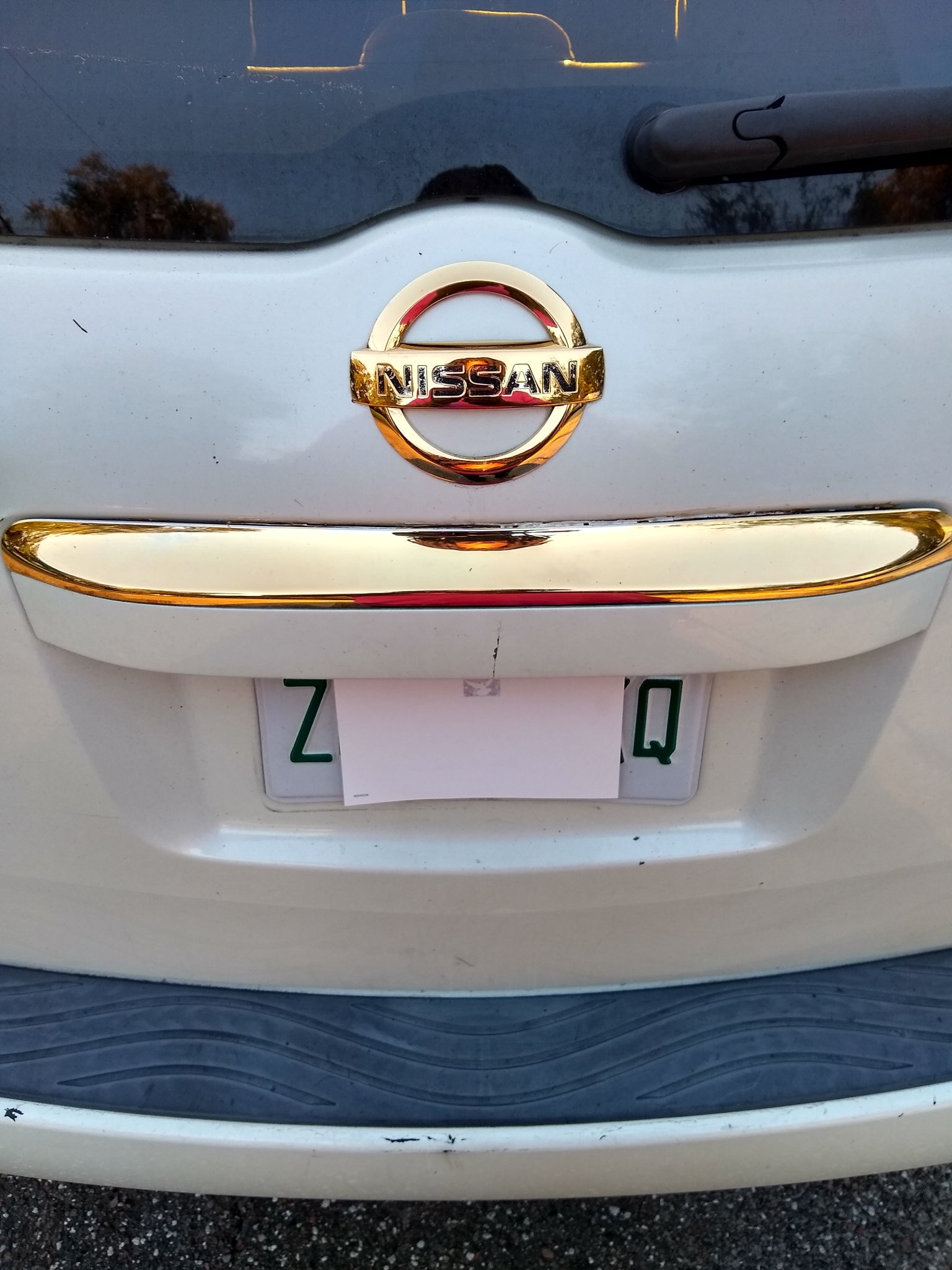 ChromeKarats gold plating work — Gold Nissan Emblem & Trunk Handle
